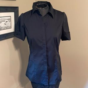 Ann Taylor black button up tapered and collared dress shirt.